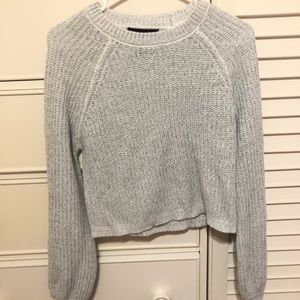 White sweater mixed with greyish-black specks